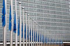 European flags fly at half-mast in front of the Berlaymont